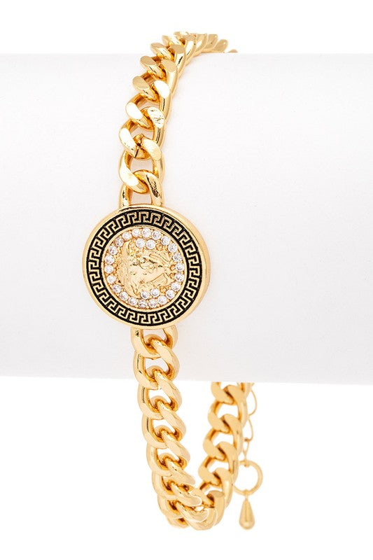 Melida Medallion Charm Bracelet in 18K gold plating with Greek-inspired circular charm and cubic zirconia center.