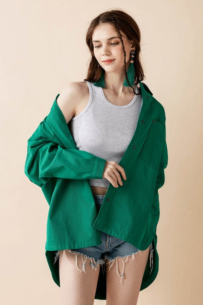Jolie Plus Size Denim Twill Shacket in Green front angle showing curved hem and front pockets