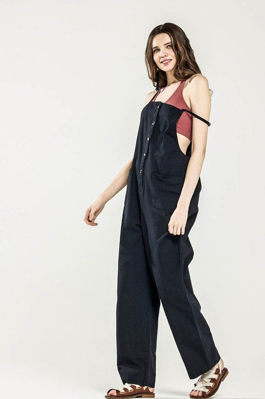 Dayana Plus Size Overall Jumpsuit in black, side view with adjustable strap detail