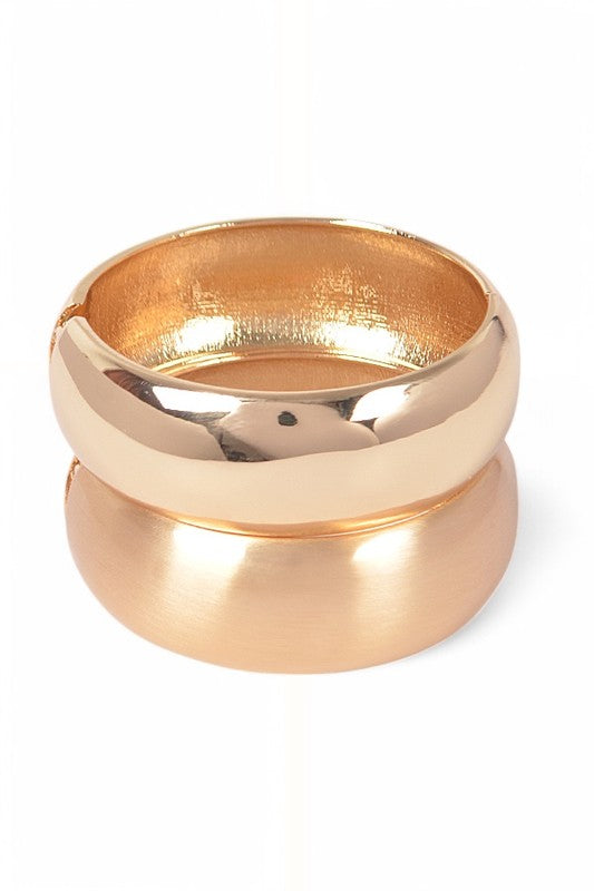 Natalia Textured 2-Piece Hinged Bangle Set in gold, with one polished finish and one brushed finish, stacked together to highlight the wide band design.