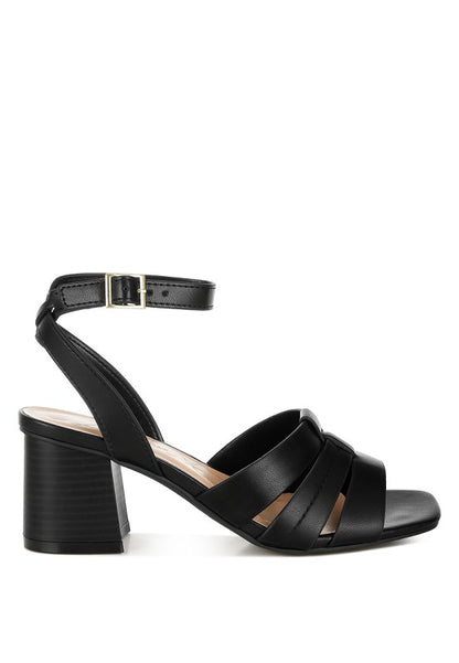 Side view of black Signora Ankle Strap Sandals with pin buckle ankle strap.