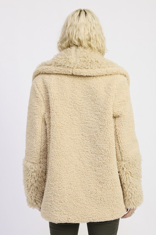 Back view of Zephyr Fleece Jacket in taupe with relaxed fit and cozy fleece finish