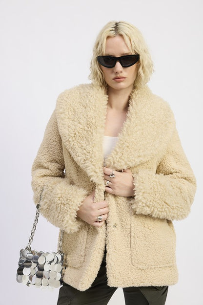 Front view of Zephyr Fleece Jacket in taupe with fur trim, snap closure, and pockets