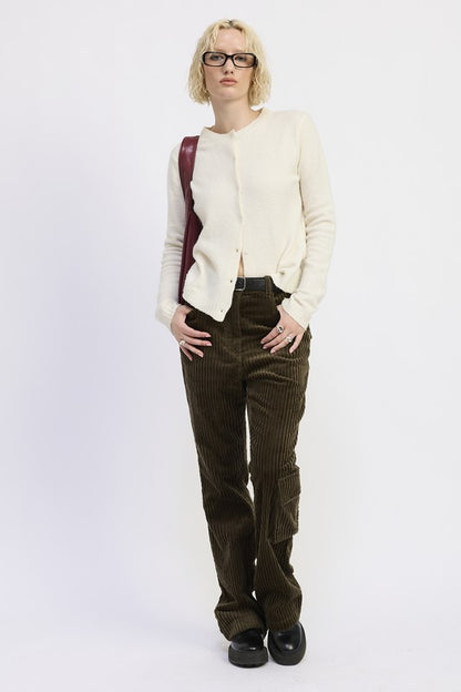 Full body walking pose in Everlee Olive Corduroy Pants with casual styling