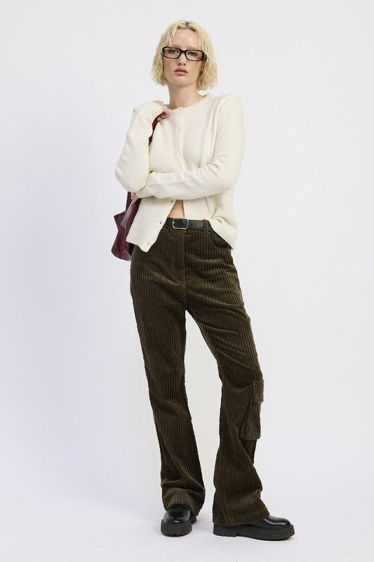 Full body front view of Everlee Olive Corduroy Pants paired with black shoes
