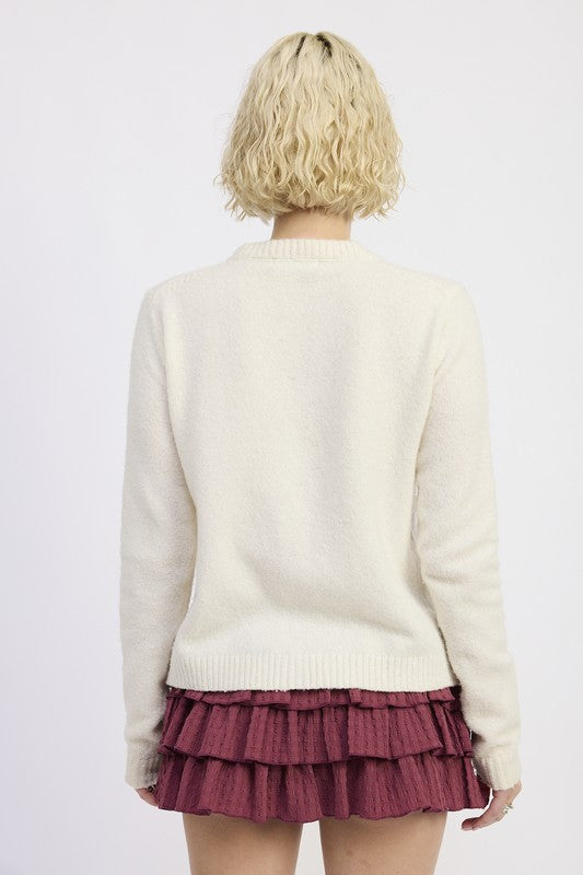 Cleo Off White cardigan back view fitted silhouette.