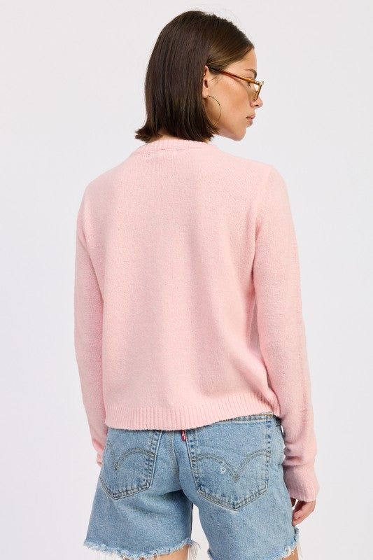 Cleo Light Pink cardigan back view fitted silhouette.