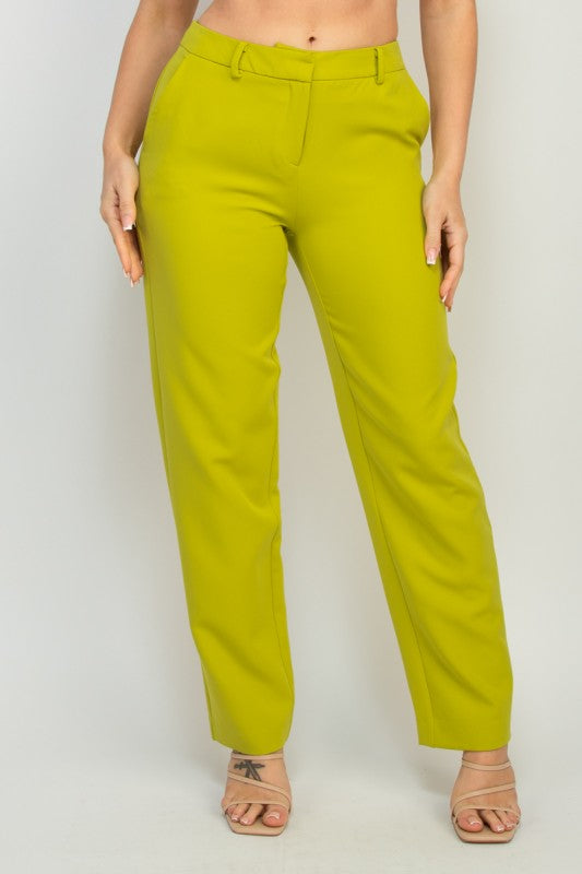 Vibrant lime pantsuit featuring midrise pants with tailored fit and button blazer for chic style.