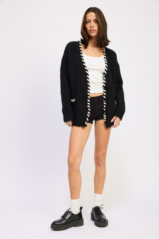 Full body front view of Londyn Trim Cardigan showcasing relaxed fit and pockets