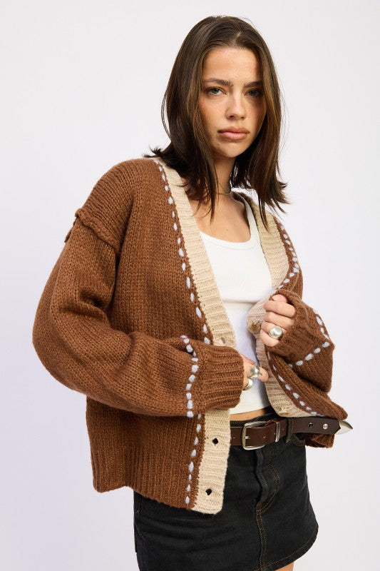 Front view of Kortney Cardigan in brown knit with cream accents on neckline