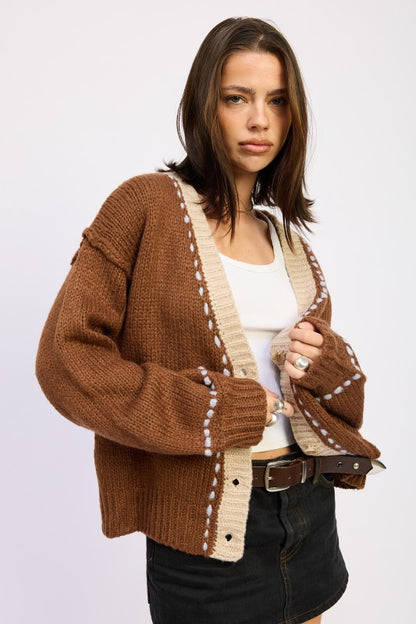 Front view of Kortney Cardigan in brown knit with cream accents on neckline