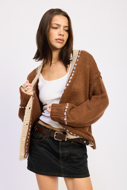 Front view of Kortney Contrasted Cardigan with stitched sleeve detail visible