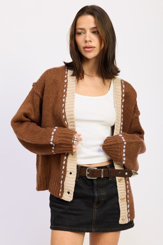 Front view of Kortney Button Down Contrasted Cardigan in brown with cream trim
