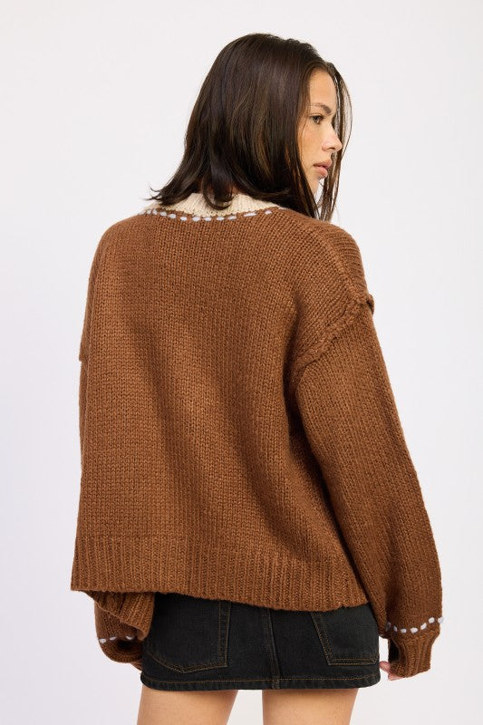 Full body back view of Kortney Button Down Contrasted Cardigan in brown knit with cream edging