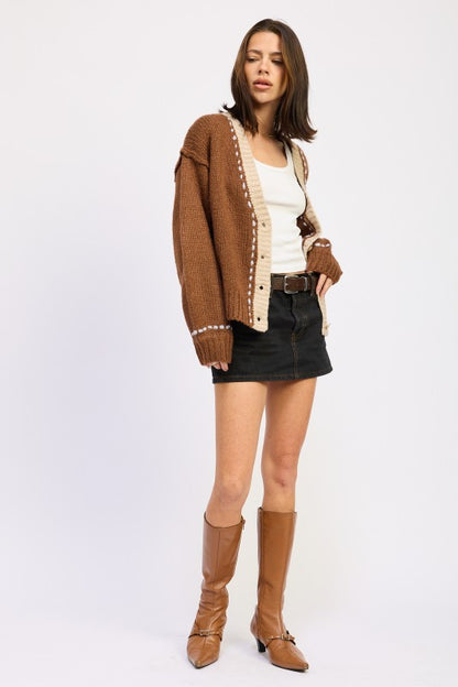 Full body front view of Kortney Button Down Cardigan showing relaxed fit and contrast trim