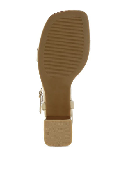 Bottom sole view of Kazara Metallic Block Heels with textured TP rubber outsole.