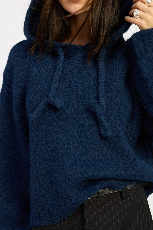 Navy Juniper Fringe Hoodie close up of knit texture and drawstring ties