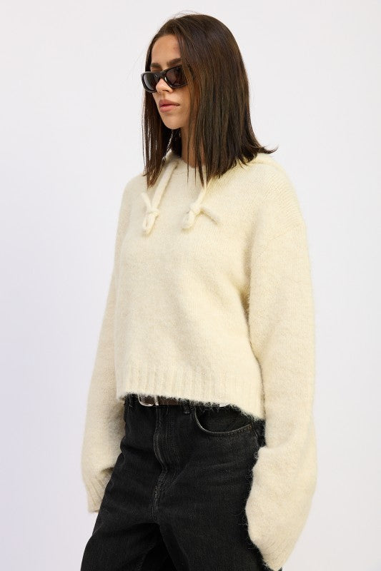 Ivory Juniper Fringe Hoodie side view showing oversized sleeves