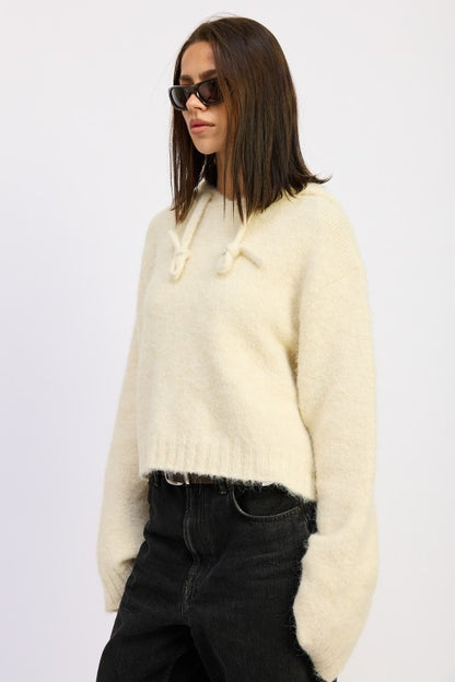 Ivory Juniper Fringe Hoodie side view showing oversized sleeves