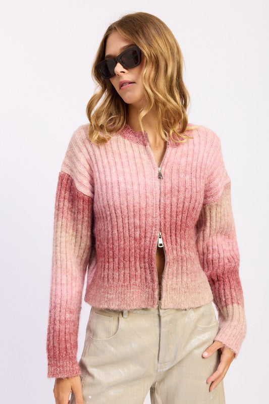 Model front view wearing Lexi Ribbed Cardigan in rose ombré with relaxed fit.