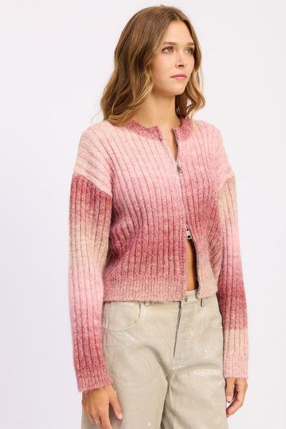 Side angle of Lexi Ribbed Cardigan showing gradient sleeve detail and ribbed knit.