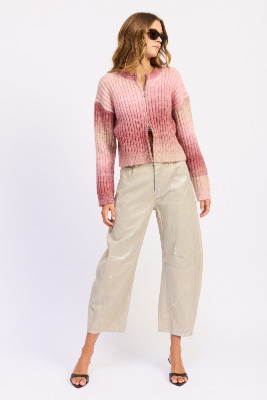 Model full body wearing Lexi Ribbed Cardigan with beige trousers, standing pose.