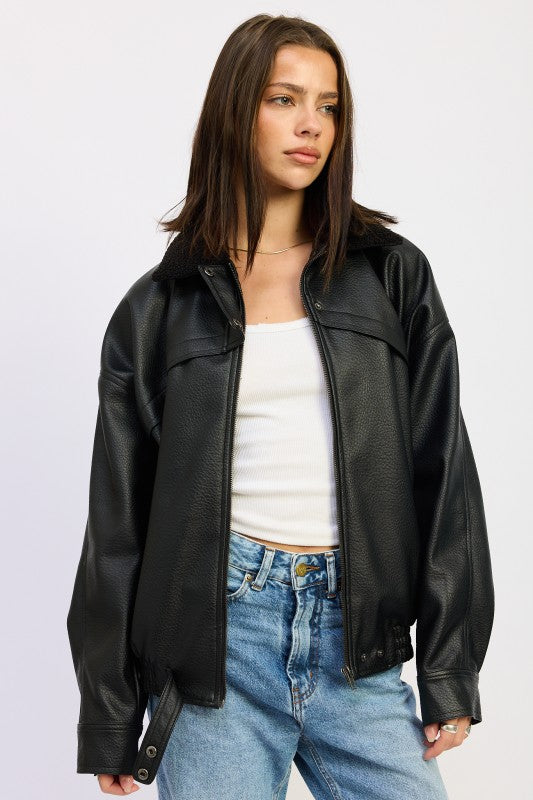 Jordan Vegan Leather Jacket with shearling collar and zip front closure.