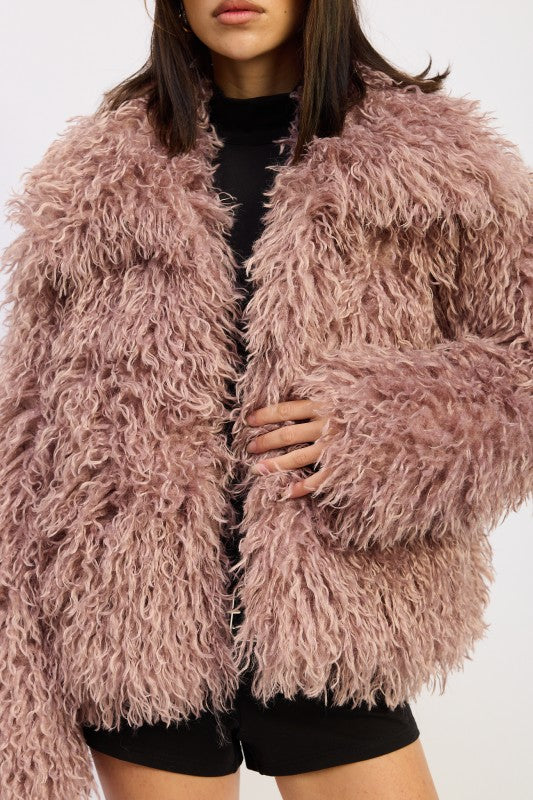 Texture close up of the Chana Shaggy Faux Fur Coat showing shaggy faux fur fabric