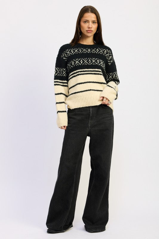 Model in Adaline Fair Isle Striped Oversized Sweater black cream, oversized cozy fit front view.
