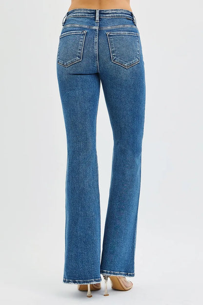 Back view of Jordy Tummy Control High Rise Flare Jeans highlighting contoured fit and pockets.