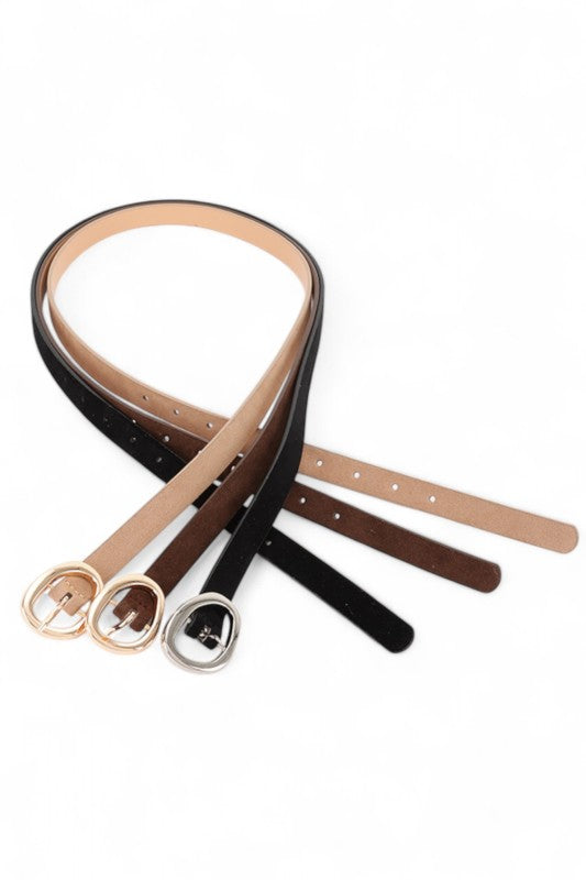 Elora Belt Set displayed together, featuring slim suede straps with gold and silver buckles.