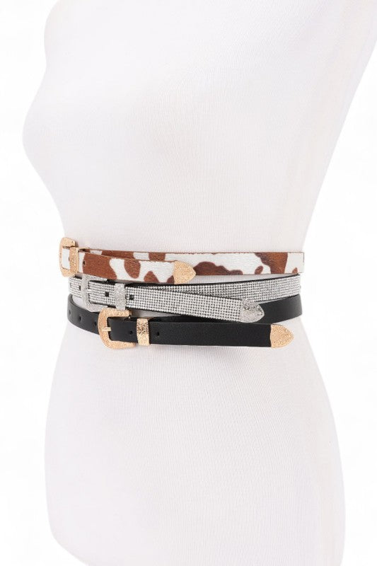 Side view of Dhara Belt Set showing slim 0.75-inch width and metallic buckles.