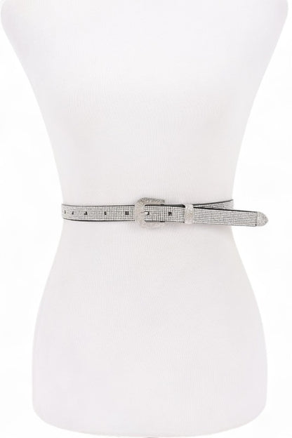 Silver Bahari Skinny Belt front view with rhinestone texture and silver buckle.