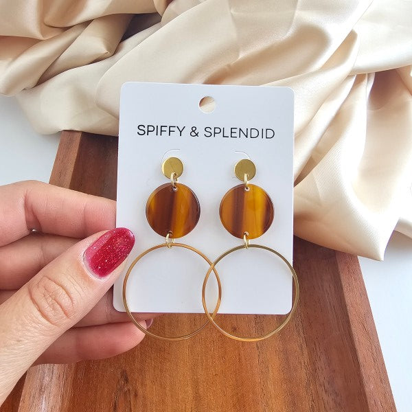 Sadie Earrings in Walnut on display card with gold plated hoop, walnut acrylic disc, stud post backing