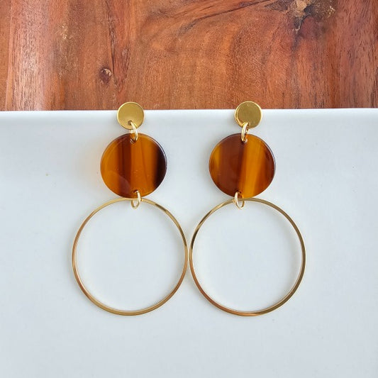 Top view of Sadie Earrings in Walnut showing walnut acrylic disc and 18k gold plated hoop dangle