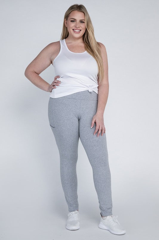 Full-length curvy plus leggings in Heather gray with a high-rise thick waistband, fitted silhouette, and convenient leg pockets.