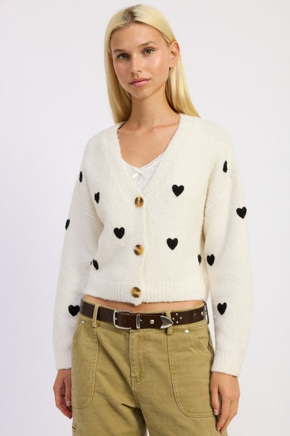 Donna Cropped Cardigan styled with high-waisted jeans for a Valentine look.