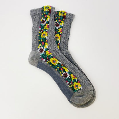 Pair of gray Noble Floral Beauty Socks with side floral embroidery pattern.