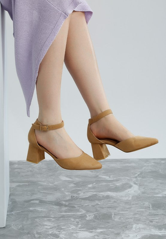 Woman wearing beige Rozita Block Heels showing both lateral and medial side views