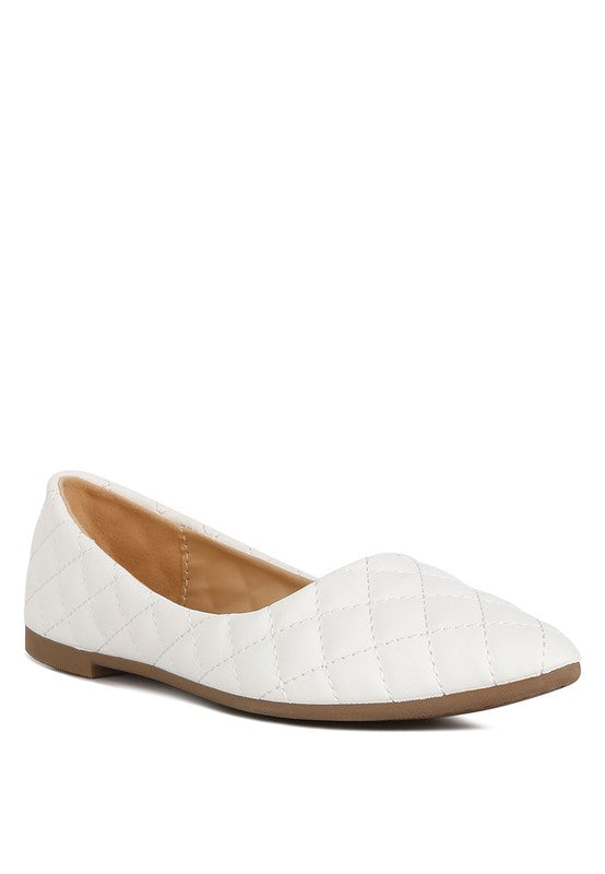 White quilted ballet flats front angle view.