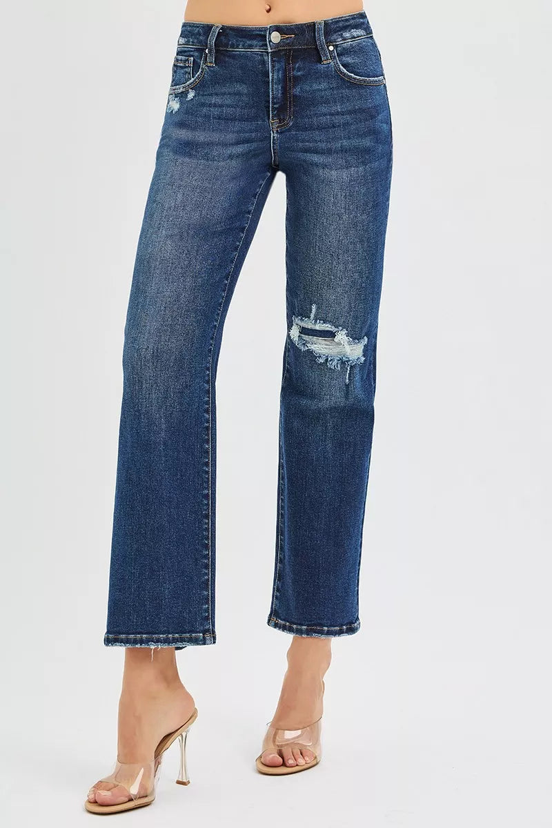 Jenna High Rise Crop Slim Straight Jeans, dark wash denim with knee patch.