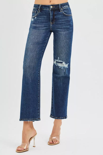 Jenna High Rise Crop Slim Straight Jeans, dark wash denim with knee patch.