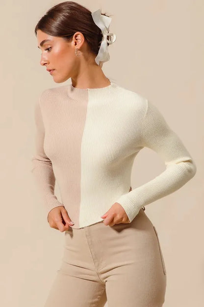 Side view of Bess Fitted Color Block Sweater showing cropped cut and ribbed detail.