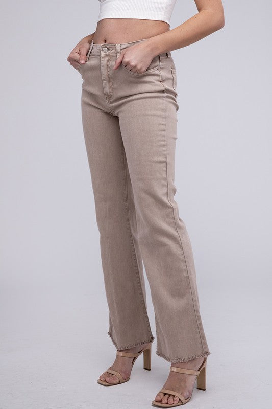 Ash mocha acid-washed straight wide-leg pants featuring a frayed cutoff hem, zip fly closure, and a relaxed fit. Made with stretchy fabric for comfort and a unique vintage-inspired look.