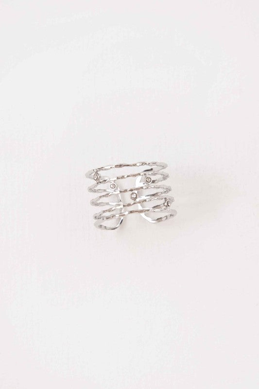 Top view of Twig Adjustable Ring Silver with five layered bands and stones.