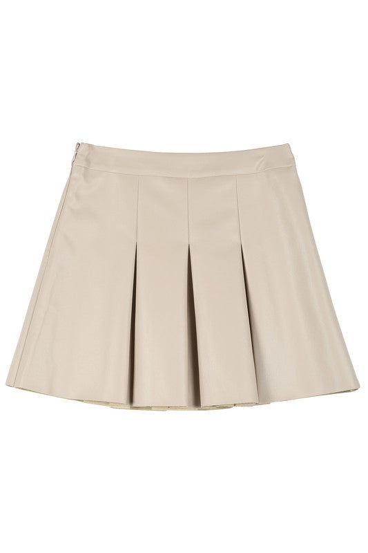 Ivory vegan leather pleated mini skirt with 4 pin tucks on the front and back for added style. Features a zipper closure.