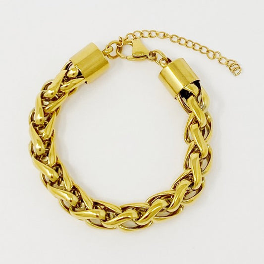 Bold & Edgy Chain Bracelet in gold link design displayed in a circular flat lay