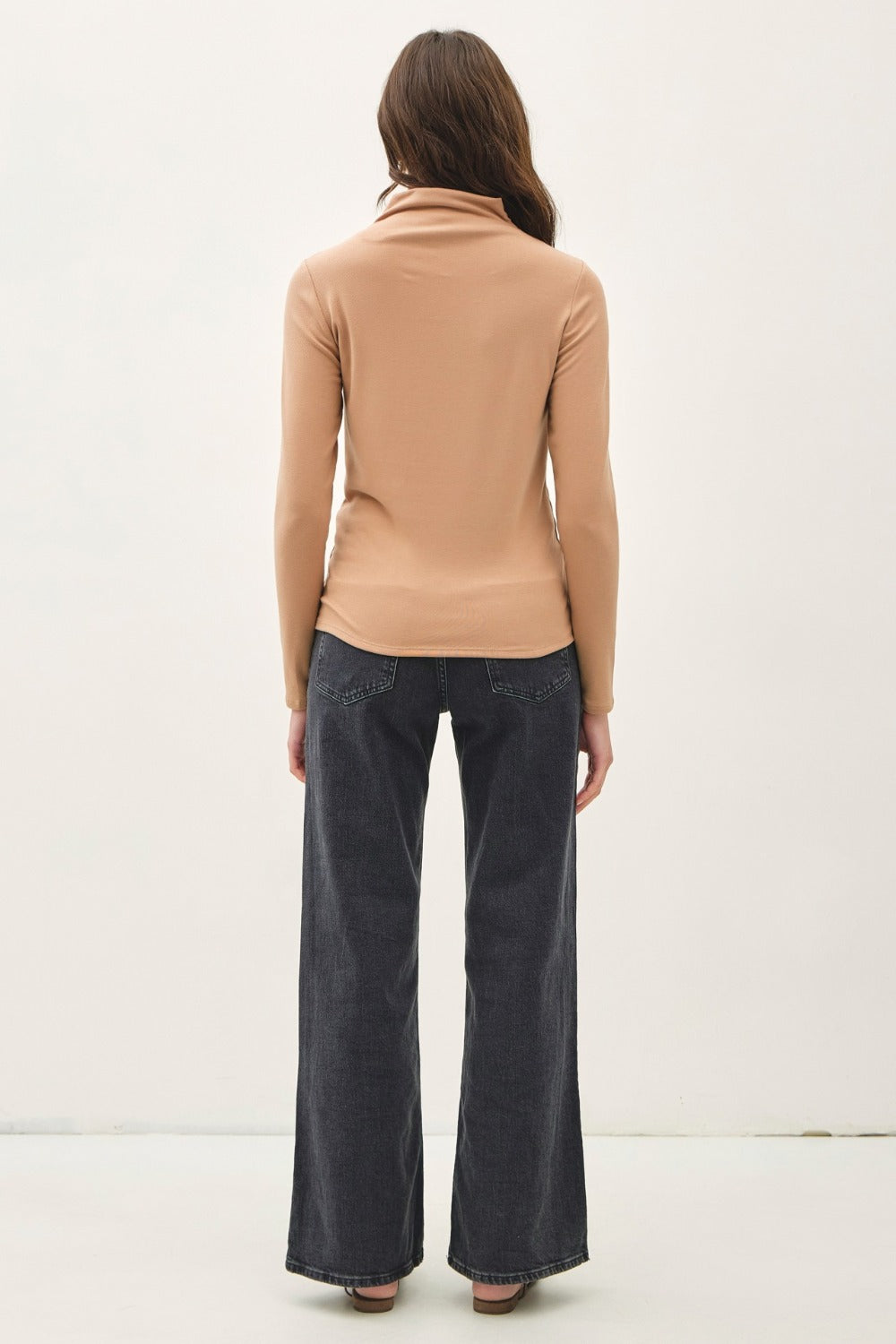 Camel mock neck long sleeve t-shirt in soft, stretchy fabric.