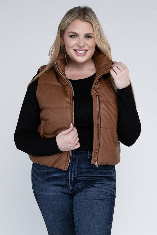 Plus Size Puff Vest in brown, featuring a relaxed fit, zip closure, pockets, and a collar neckline. Stylish and functional, this sleeveless waist-length vest is perfect for casual cold-weather layering