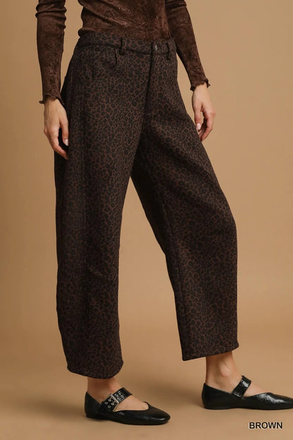 Side angle of Finley leopard print pants with pockets and breezy wide leg design.